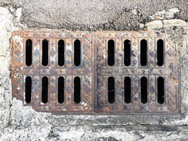 A grate that leads to a local sewer system.