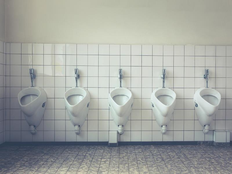 An example of a public bathroom, with a wall of urinals